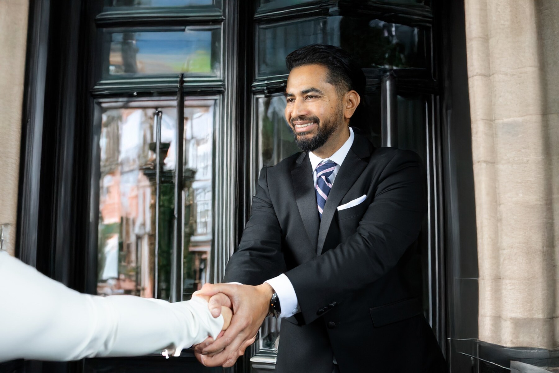 Tafiqul Abu Mohammad welcoming an Ottawa real estate client